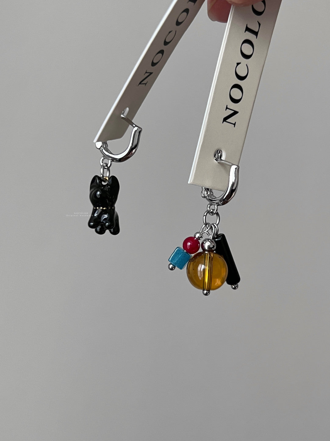 A Black Puppy Asymmetric Earrings