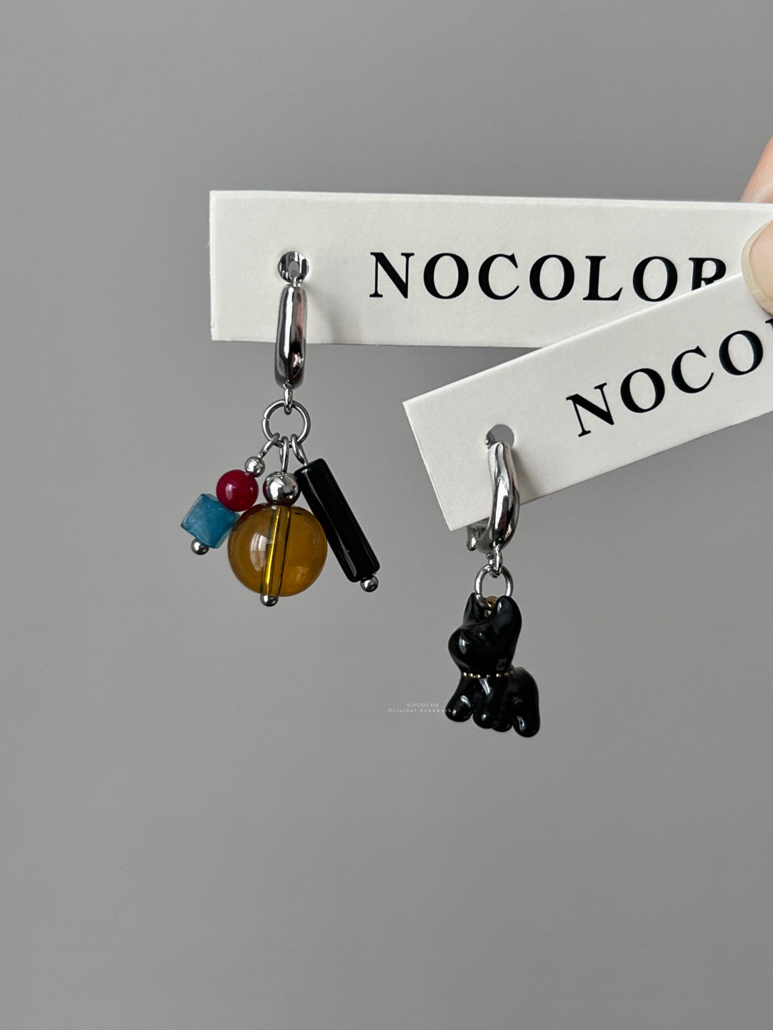 A Black Puppy Asymmetric Earrings
