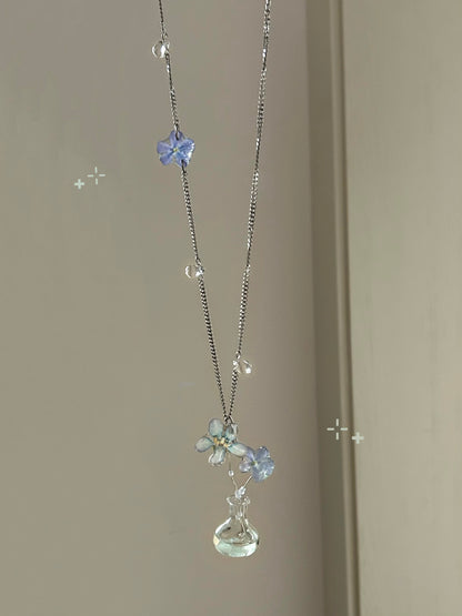 A Quiet Blue Blossom Resin Necklace | Necklace | Three Fleas