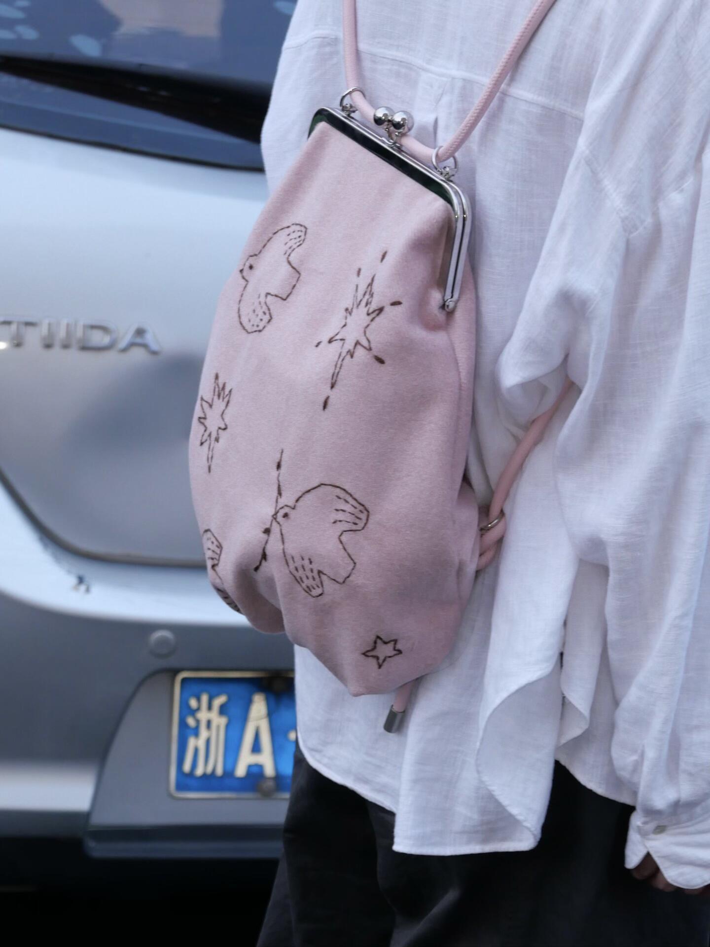 Bird Embroidered Kiss Lock Backpack
