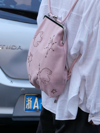 Bird Embroidered Kiss Lock Backpack