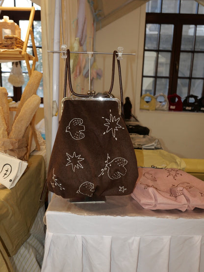 Bird Embroidered Kiss Lock Backpack