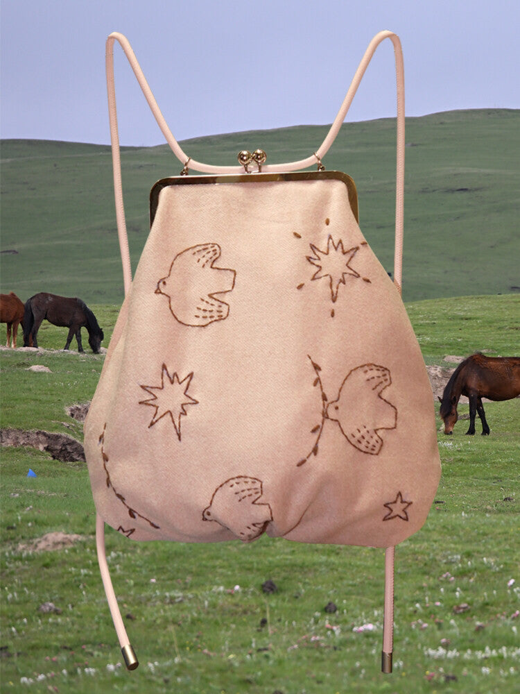 Bird Embroidered Kiss Lock Backpack