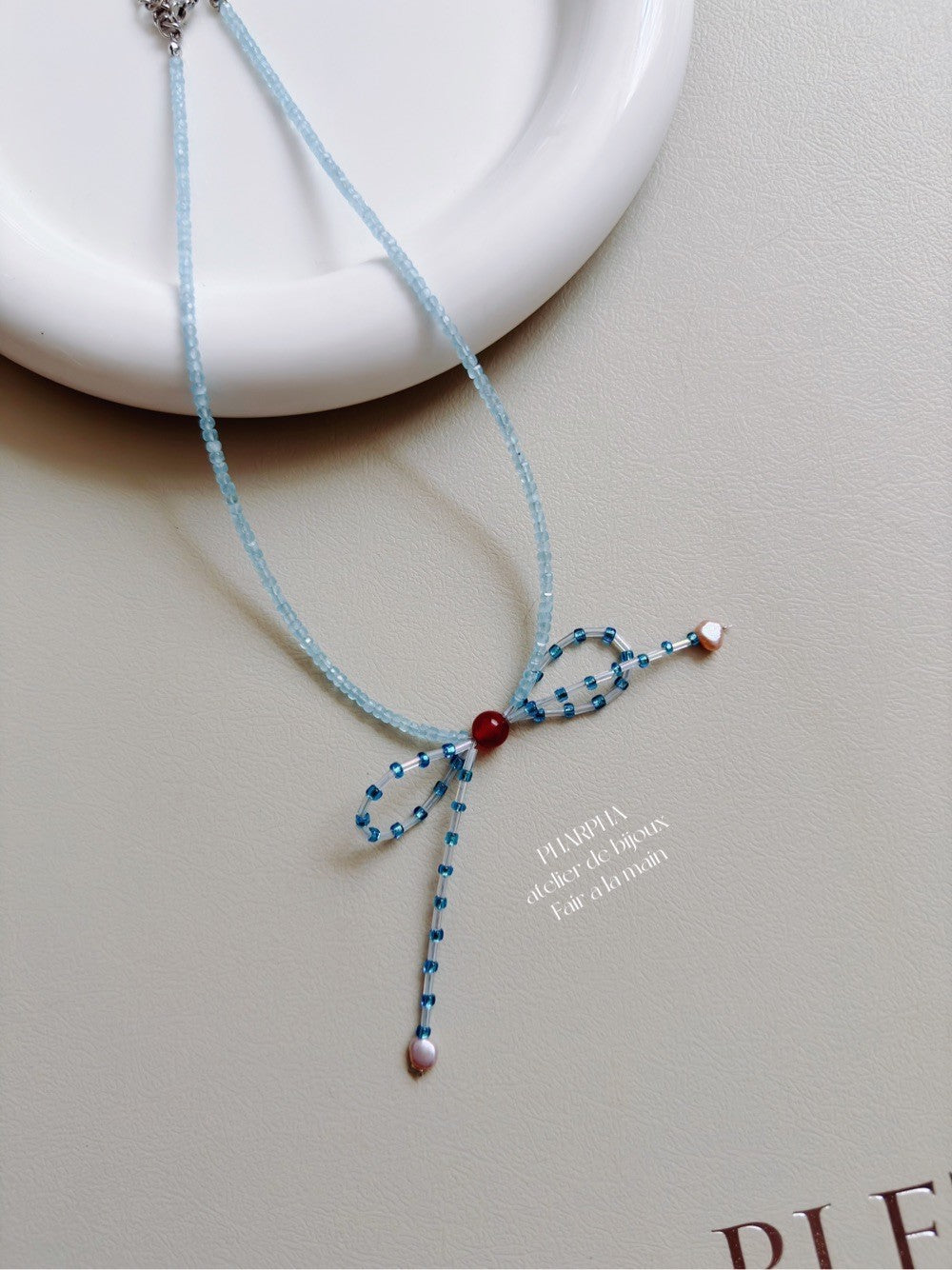 Blue Bow Pearl Beaded Necklace