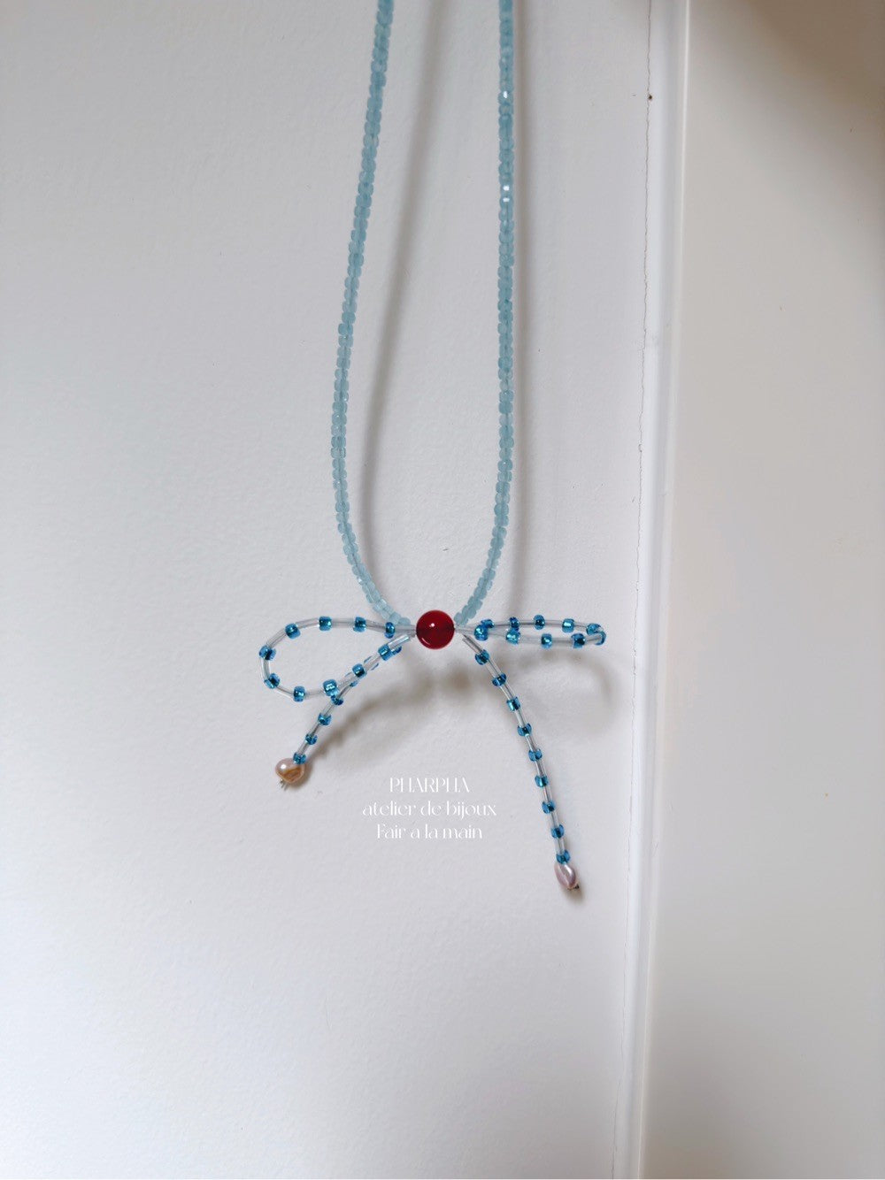 Blue Bow Pearl Beaded Necklace