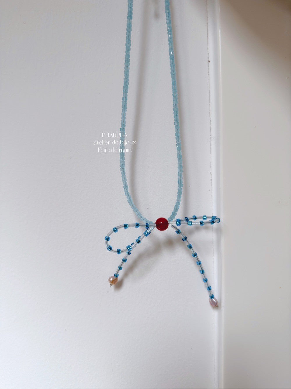 Blue Bow Pearl Beaded Necklace