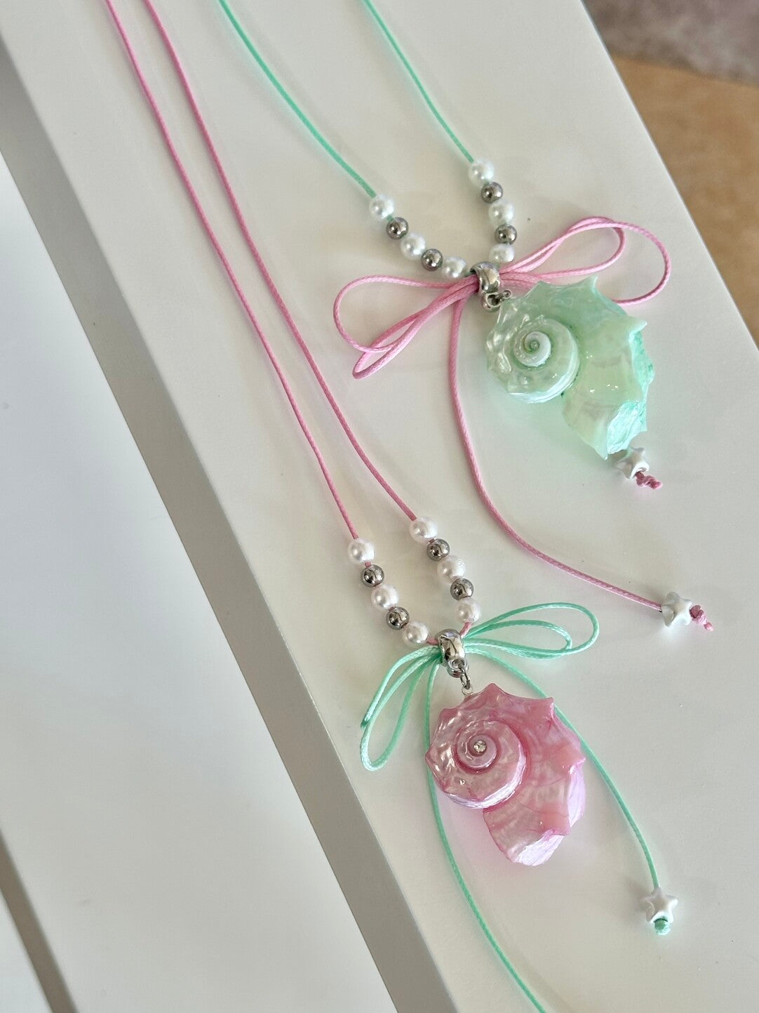 Bow-Tied Pink Mint Conch Necklace