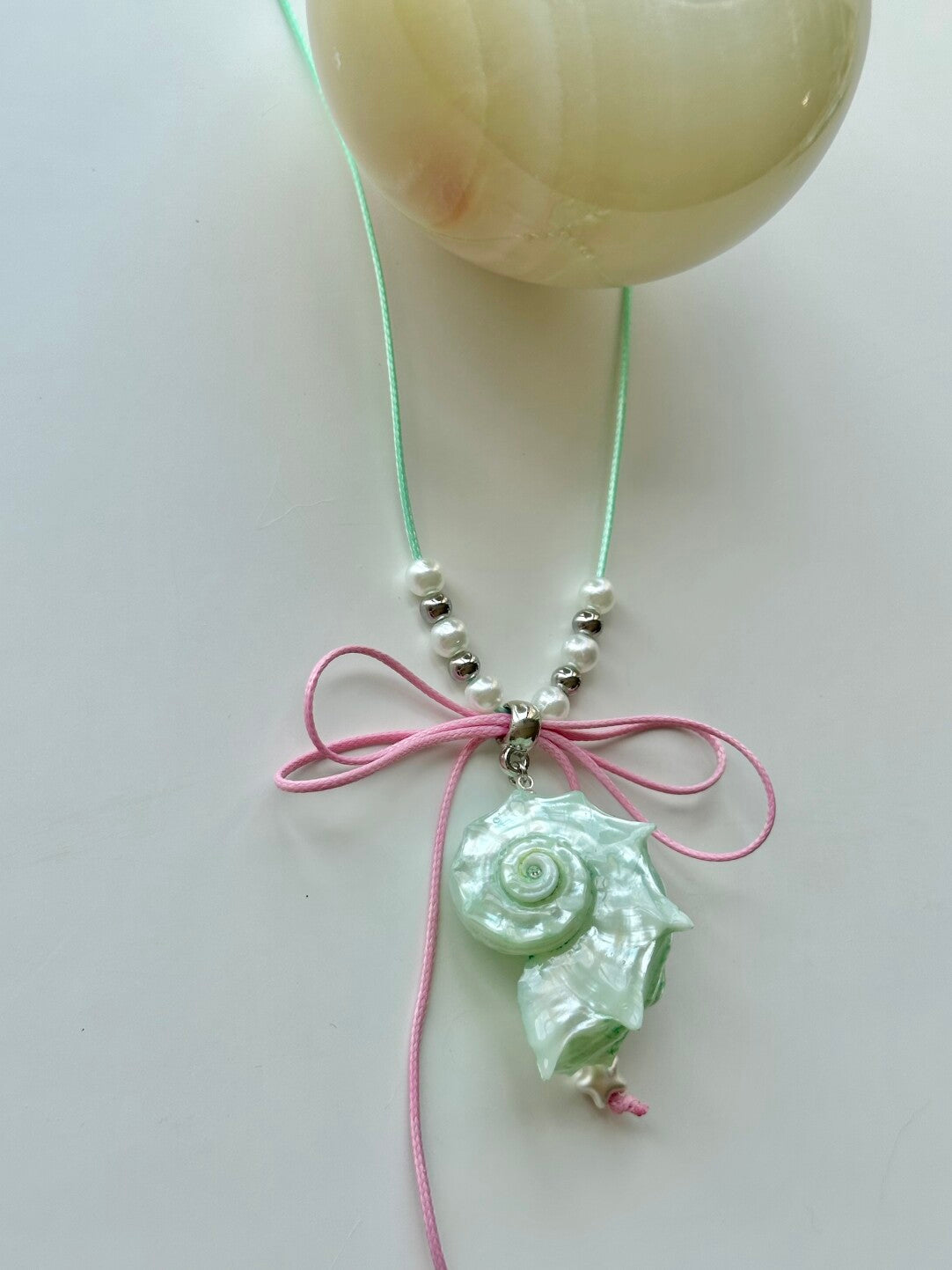 Bow-Tied Pink Mint Conch Necklace