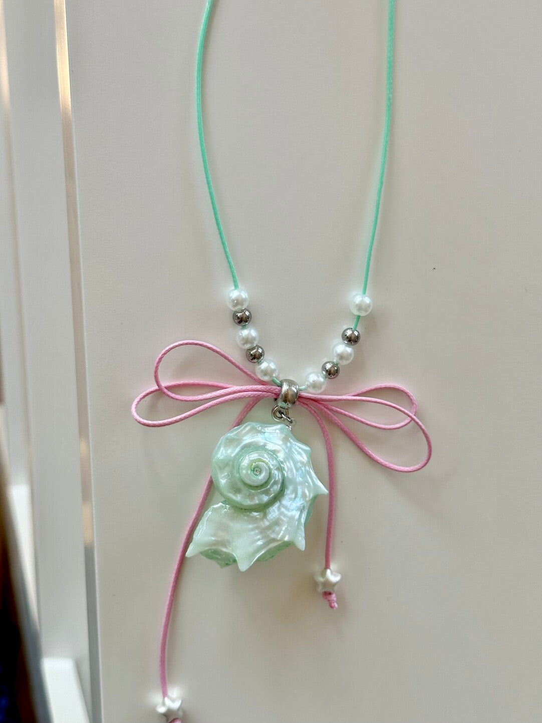 Bow-Tied Pink Mint Conch Necklace