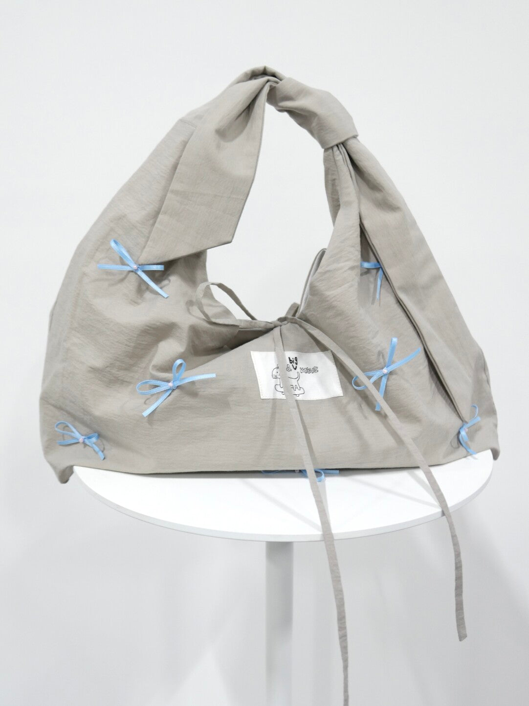 Bow Tie-Strap Soft Triangle Shoulder Crossbody Bag