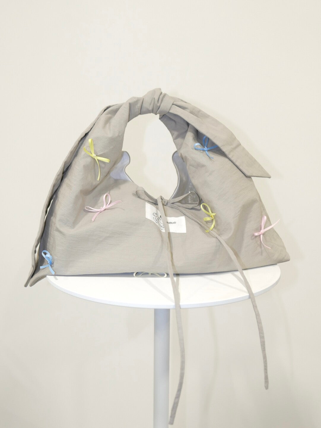 Bow Tie-Strap Soft Triangle Shoulder Crossbody Bag