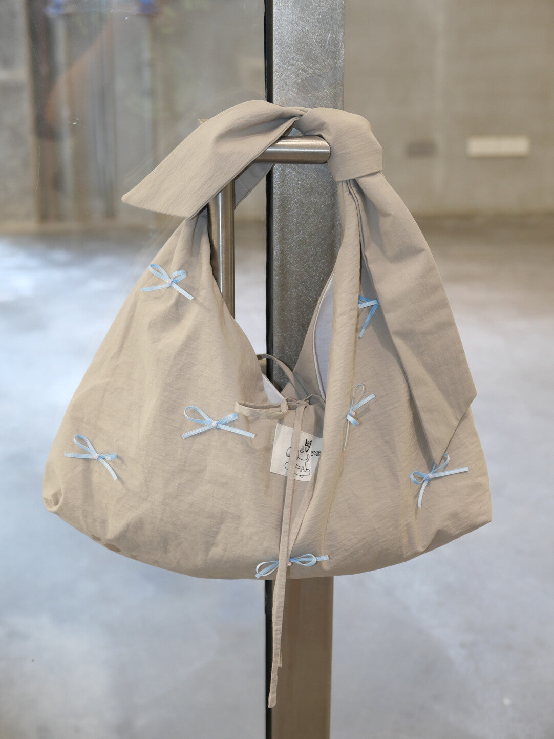 Bow Tie-Strap Soft Triangle Shoulder Crossbody Bag