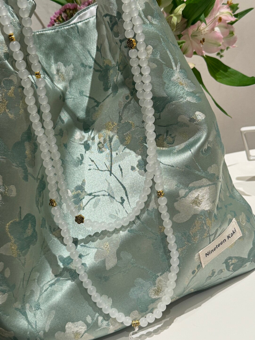 [Chinoiserie] White Floral Teal Green Beaded Tassel Silk Bag | Bag | Three Fleas