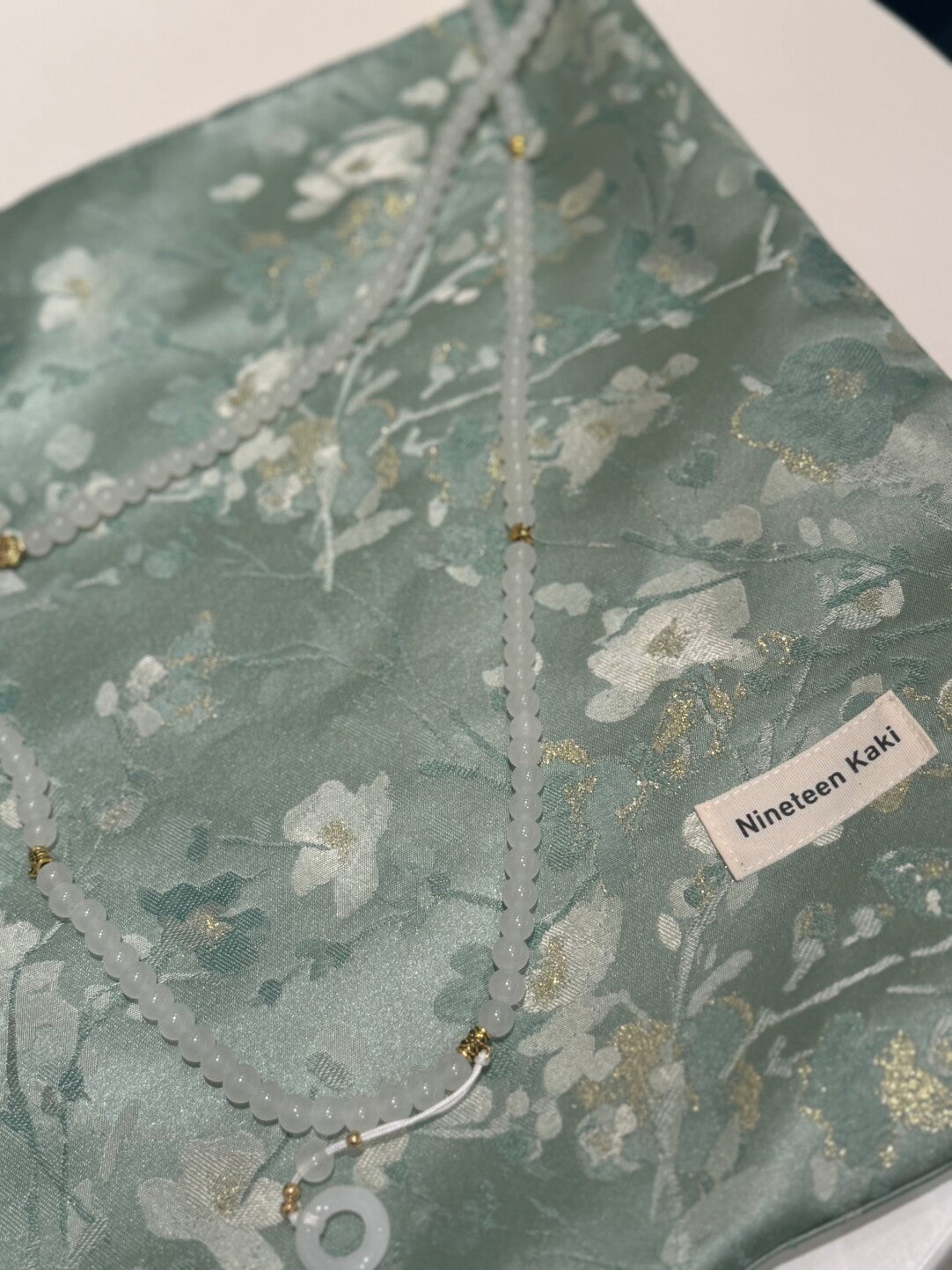 [Chinoiserie] White Floral Teal Green Beaded Tassel Silk Bag | Bag | Three Fleas