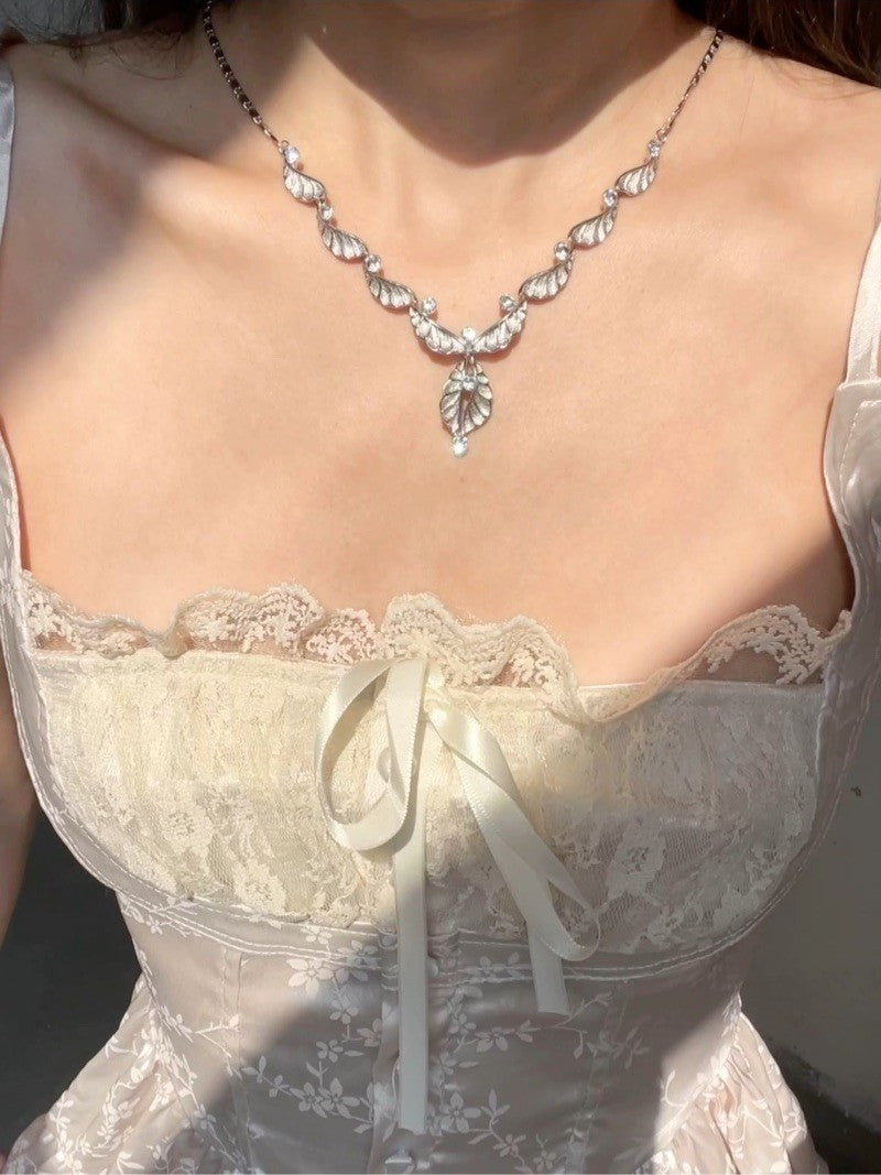 Elegant Ruffle Wing Silver Necklace