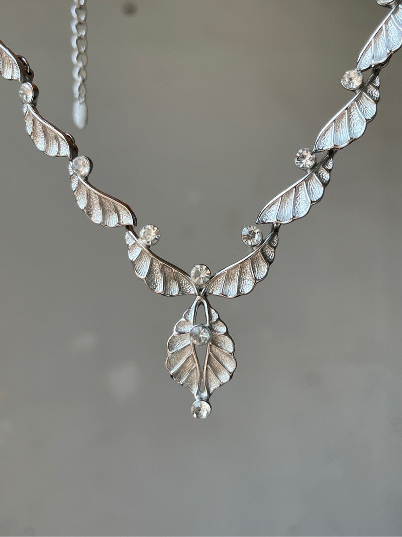 Elegant Ruffle Wing Silver Necklace