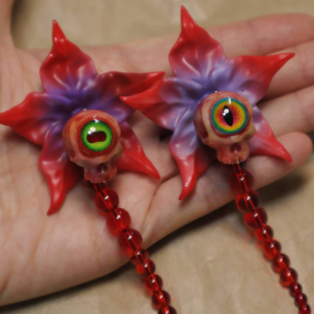 Eye Flower Hand Tassel Earrings
