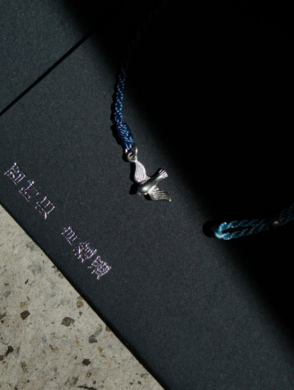 Flying Bird Silver Braided Bracelet