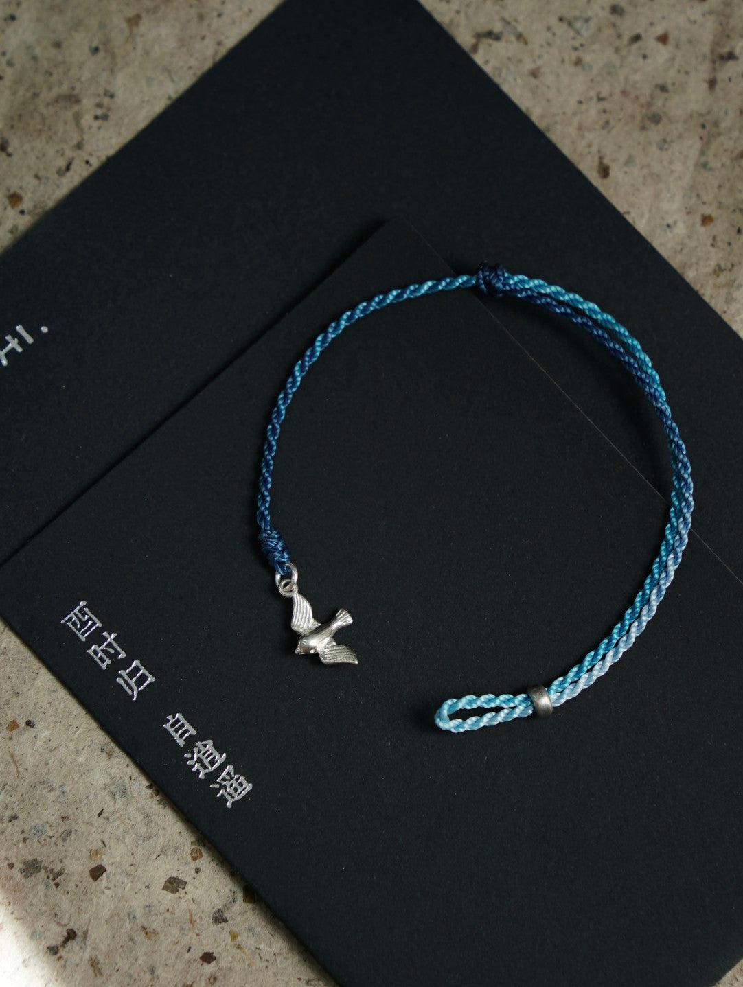 Flying Bird Silver Braided Bracelet