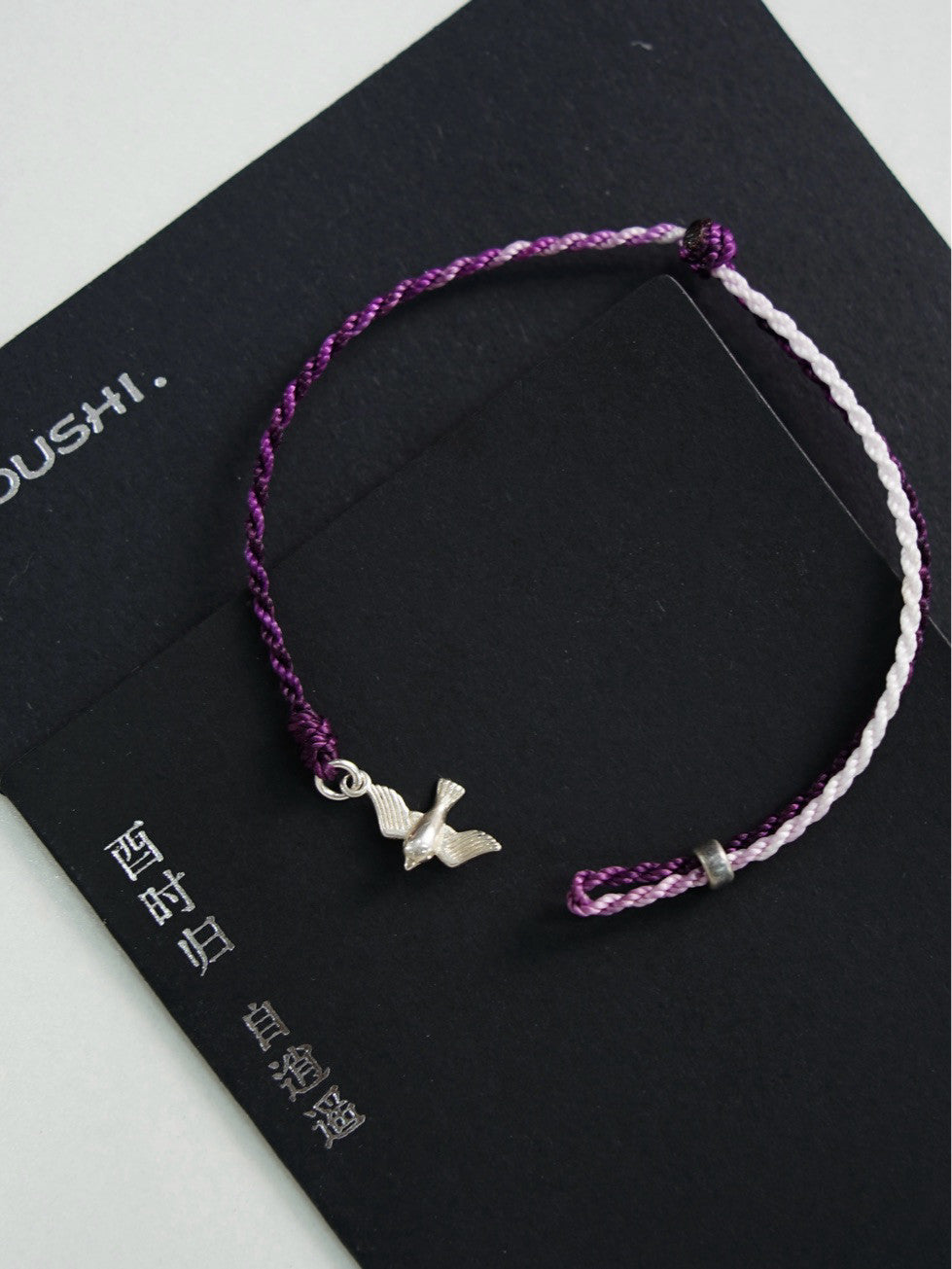 Flying Bird Silver Braided Bracelet