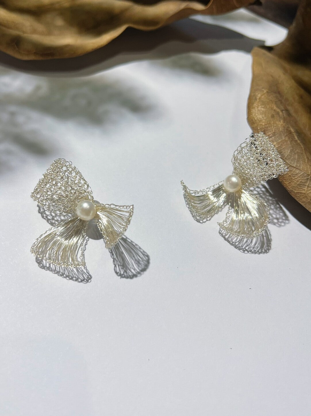 Metal Woven Bow Natural Pearl Earrings