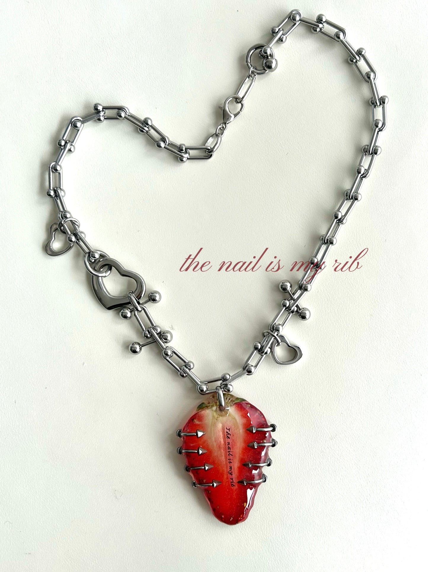 “Nails Are My Ribs” Strawberry Resin Necklace | Necklace | Three Fleas