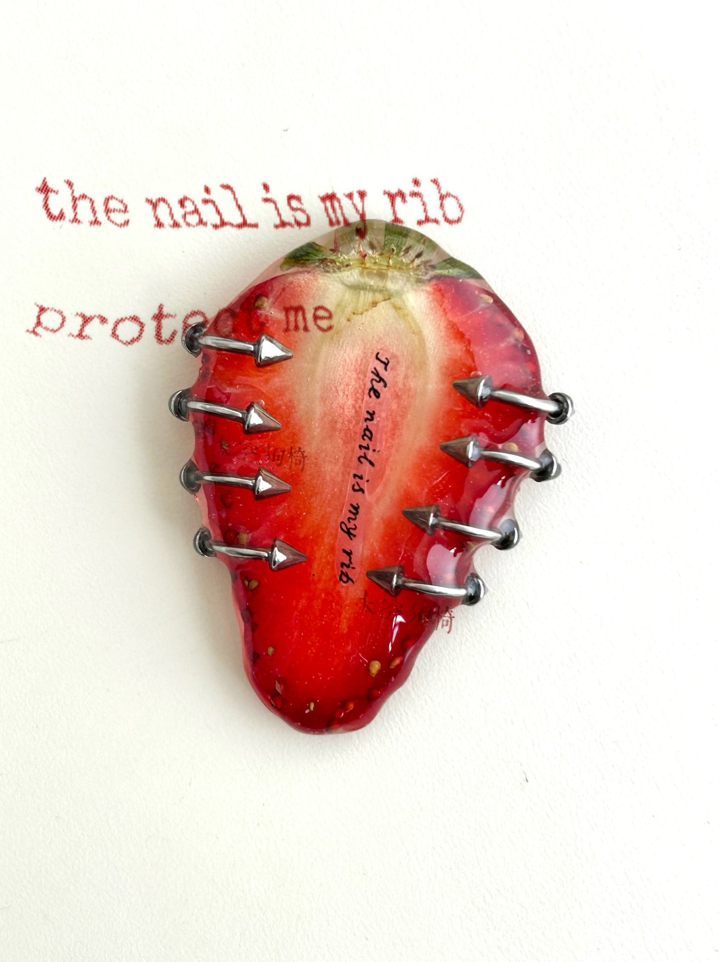 “Nails Are My Ribs” Strawberry Resin Necklace | Necklace | Three Fleas