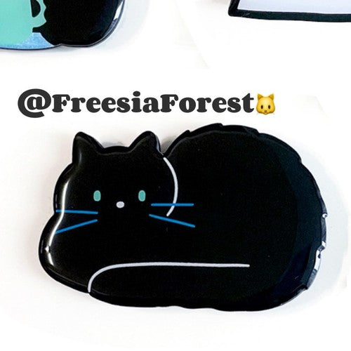 The Tucked Hand Kitten Phone Stand