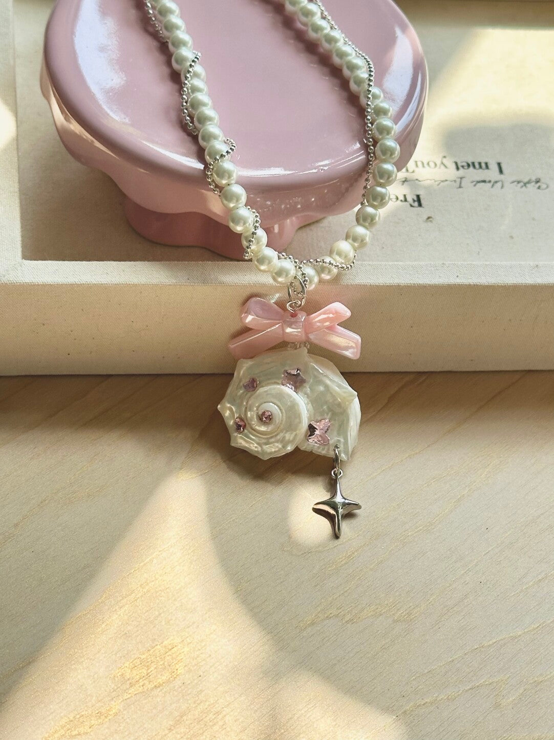 Pink Bow Conch Pearl Necklace