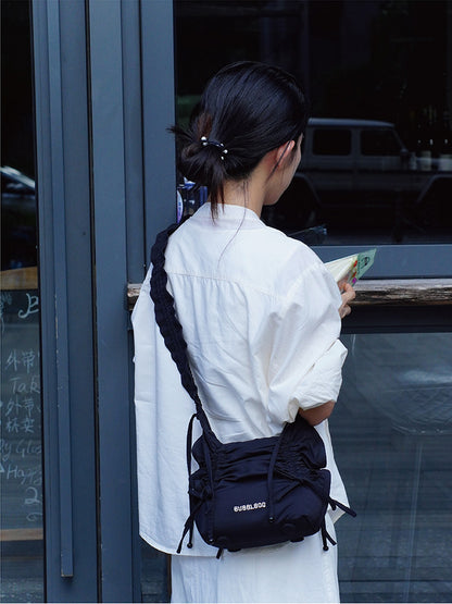 Ruffled Bow Drawstring Crossbody Bag