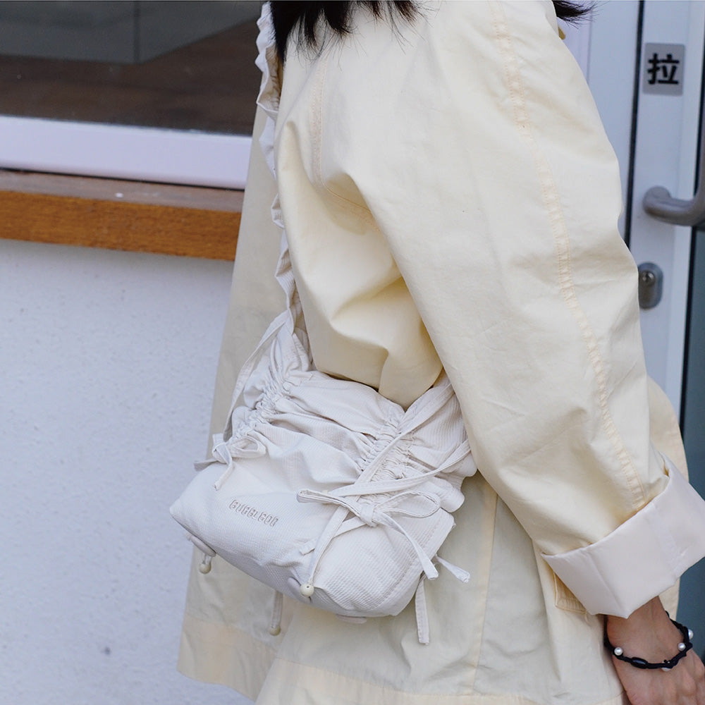 Ruffled Bow Drawstring Crossbody Bag