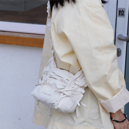 Ruffled Bow Drawstring Crossbody Bag