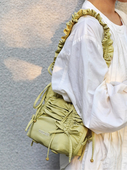 Ruffled Bow Drawstring Crossbody Bag