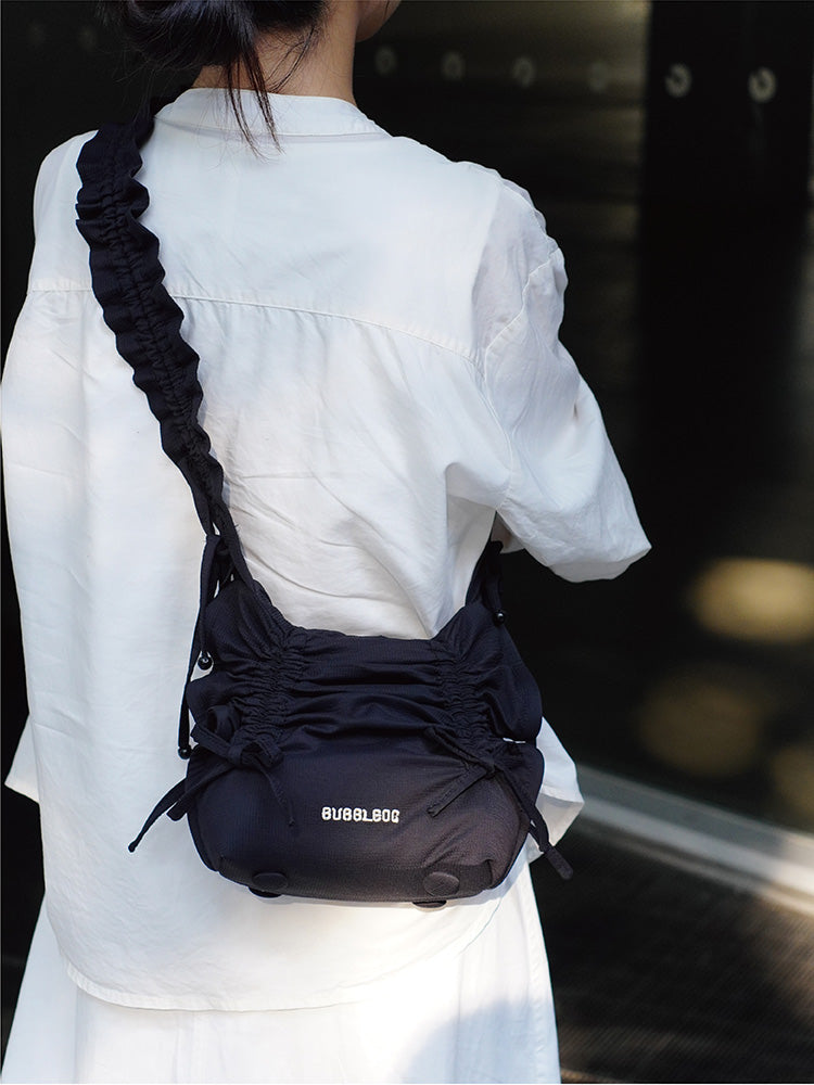 Ruffled Bow Drawstring Crossbody Bag