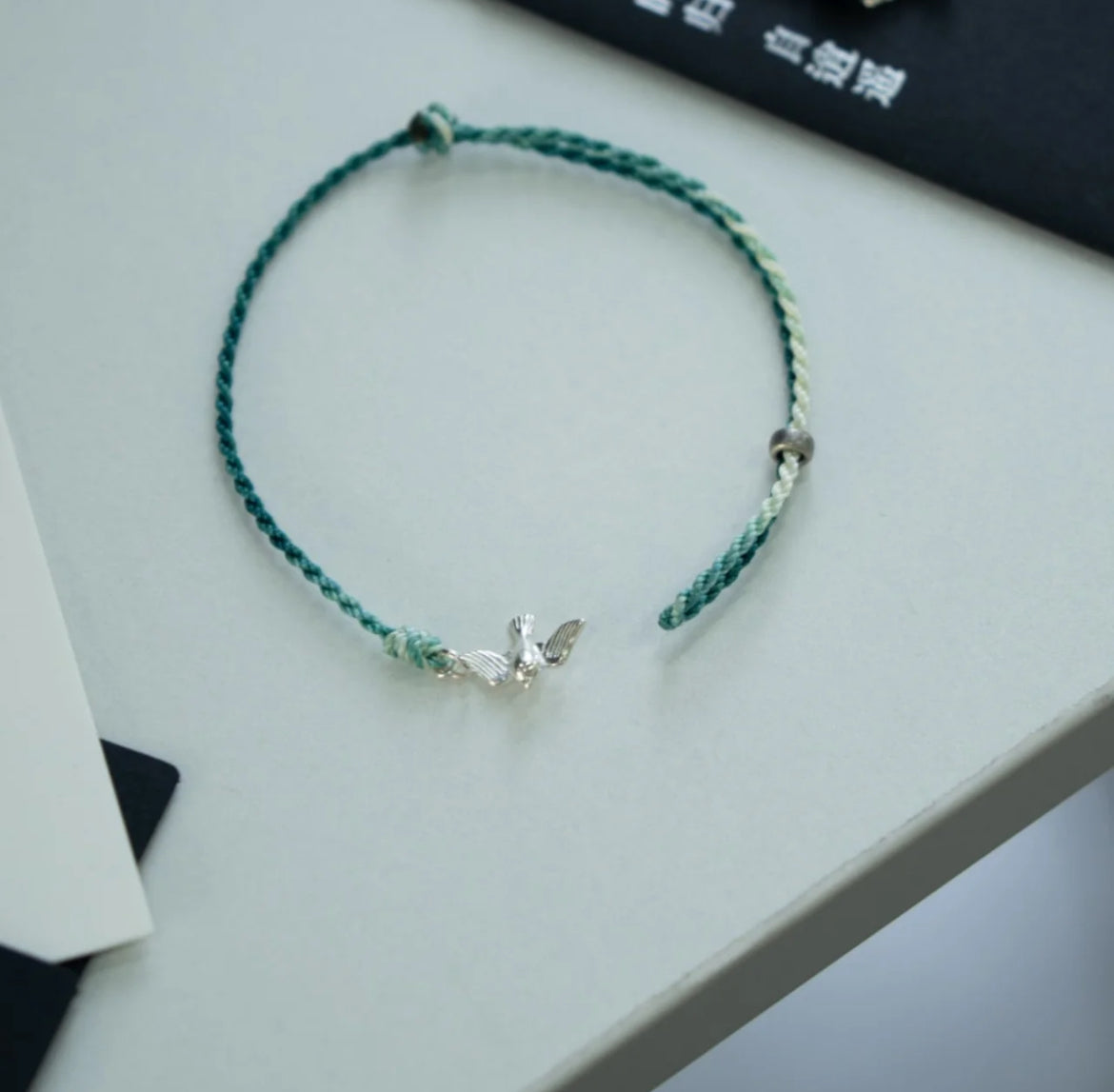 Flying Bird Silver Braided Bracelet